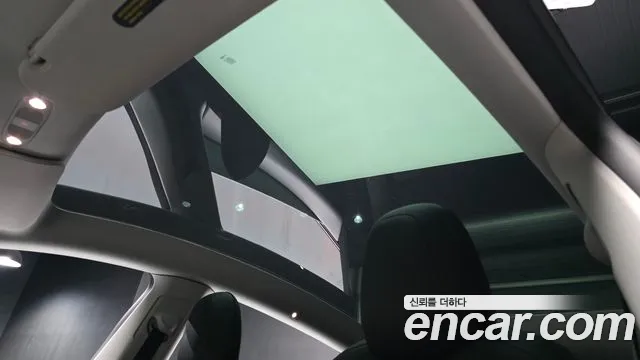 Tesla Model Y — Фото автомобиля 19