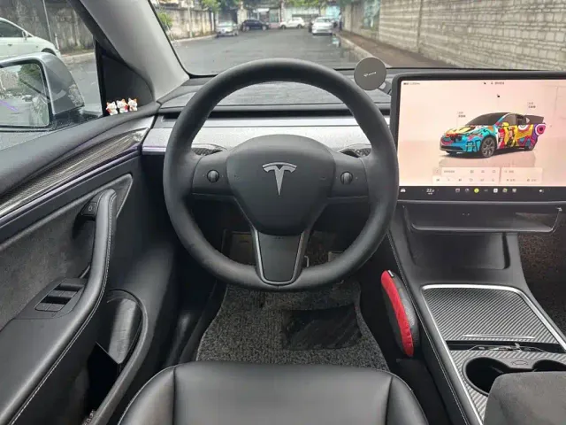 Tesla Model Y — Фото автомобиля 21