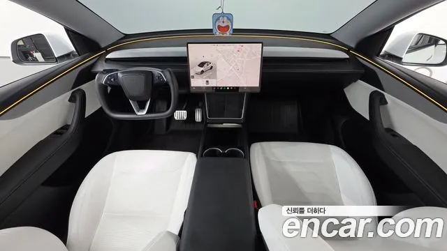 Tesla Model Y — Фото автомобиля 10