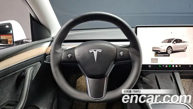 Tesla Model Y — Фото автомобиля 19