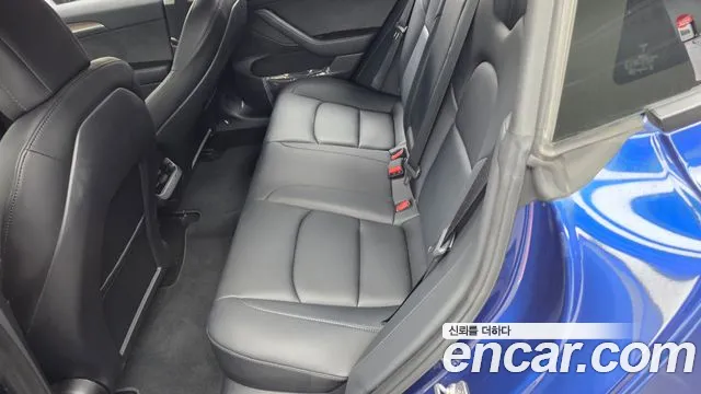Tesla Model 3 — Фото автомобиля 16