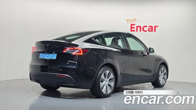 Tesla Model Y — Фото автомобиля 2