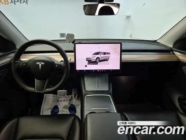 Tesla Model Y — Фото автомобиля 7
