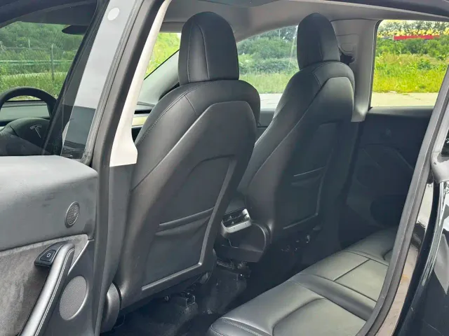Tesla Model Y — Фото автомобиля 13