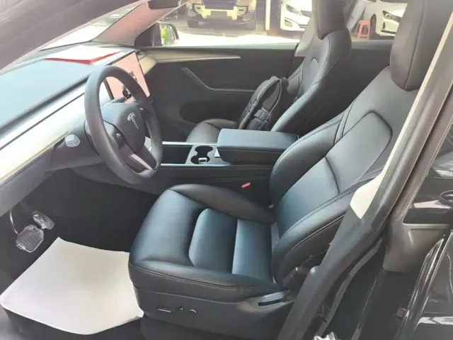 Tesla Model Y — Фото автомобиля 14