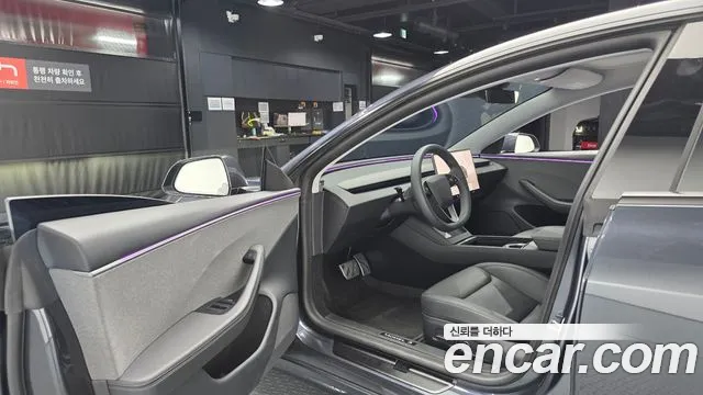 Tesla Model 3 — Фото автомобиля 15