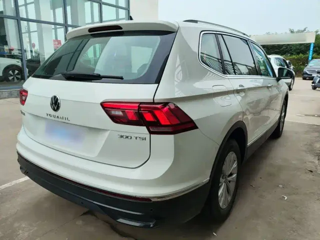 Volkswagen Tiguan L — Фото автомобиля 6