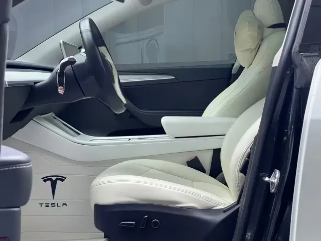 Tesla Model Y — Фото автомобиля 9