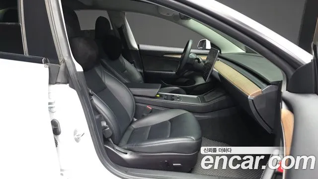 Tesla Model 3 — Фото автомобиля 11