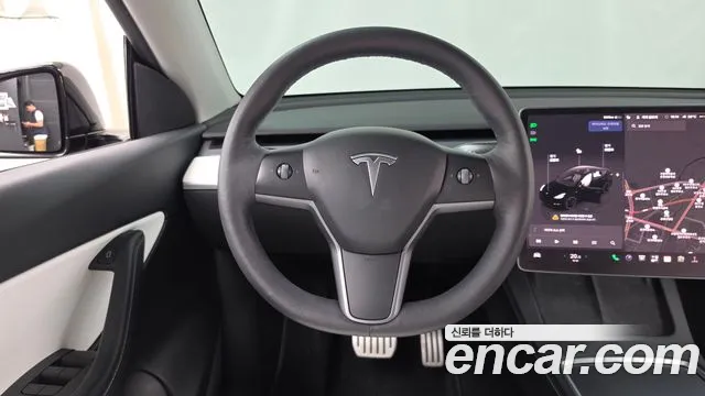 Tesla Model Y — Фото автомобиля 13