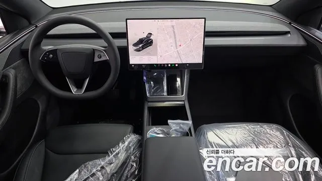 Tesla Model Y — Фото автомобиля 10