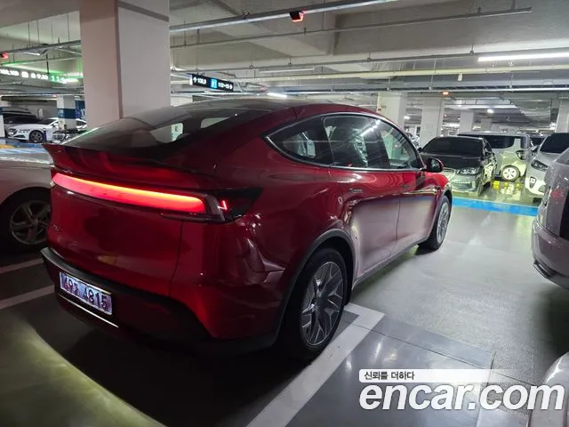 Tesla Model Y — Фото автомобиля 7