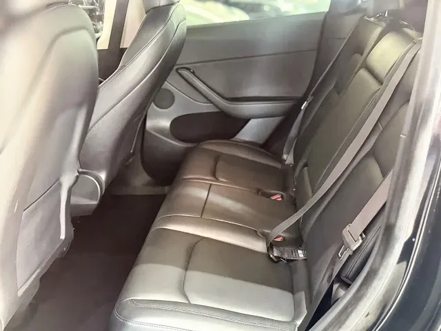 Tesla Model Y — Фото автомобиля 8