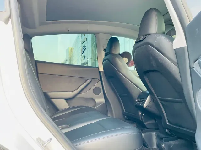 Tesla Model Y — Фото автомобиля 13