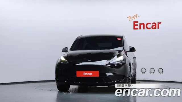 Tesla Model Y — Фото автомобиля 3