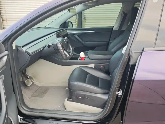 Tesla Model Y — Фото автомобиля 7