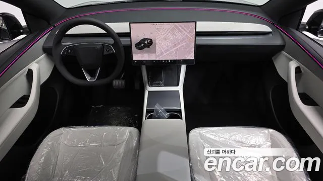 Tesla Model Y — Фото автомобиля 10
