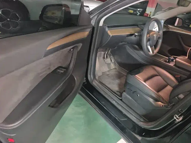 Tesla Model Y — Фото автомобиля 13