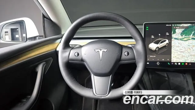 Tesla Model Y — Фото автомобиля 12