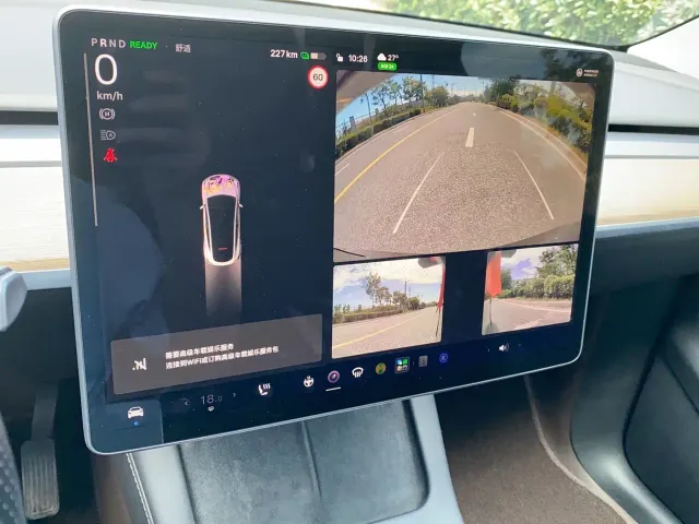 Tesla Model Y — Фото автомобиля 12