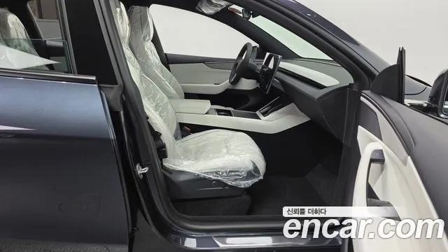 Tesla Model Y — Фото автомобиля 26