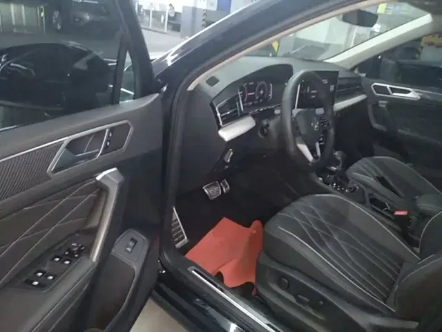 Volkswagen Tiguan L — Фото автомобиля 15