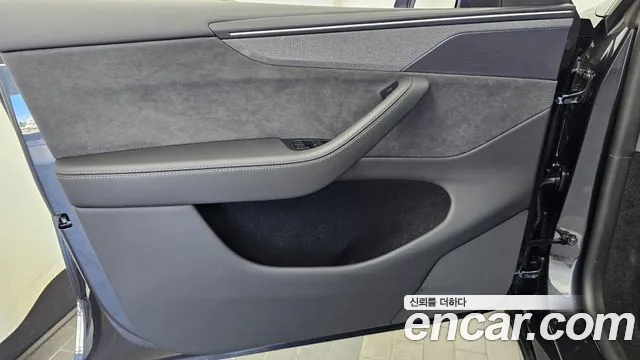 Tesla Model Y — Фото автомобиля 5