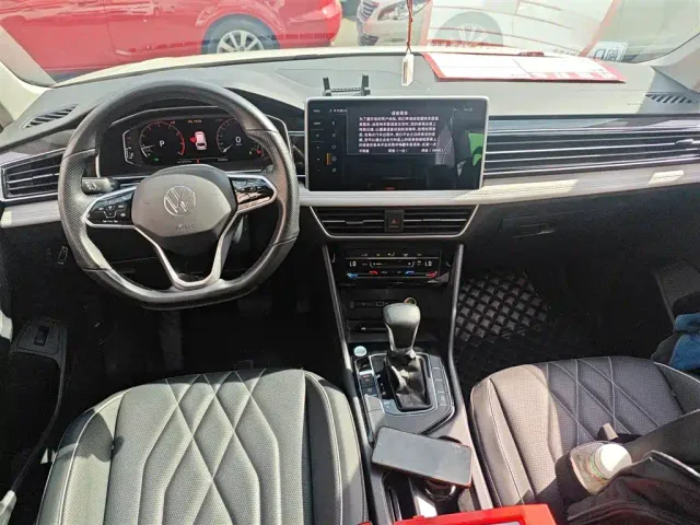 Volkswagen Tiguan L — Фото автомобиля 5