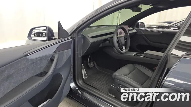 Tesla Model Y — Фото автомобиля 15