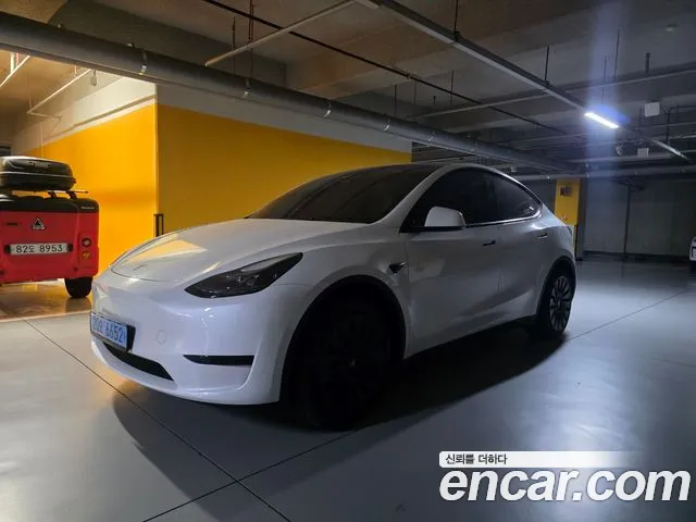 Tesla Model Y — Фото автомобиля 9