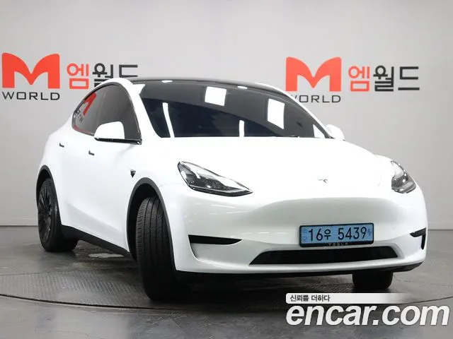 Tesla Model Y — Фото автомобиля 2