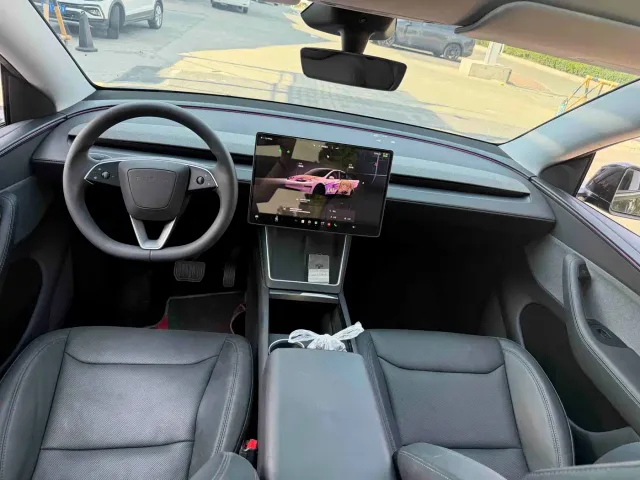 Tesla Model Y — Фото автомобиля 7