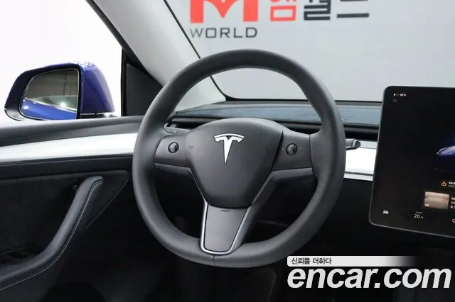 Tesla Model Y — Фото автомобиля 11