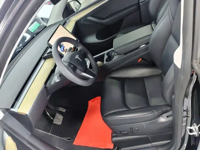 Tesla Model Y — Фото автомобиля 14