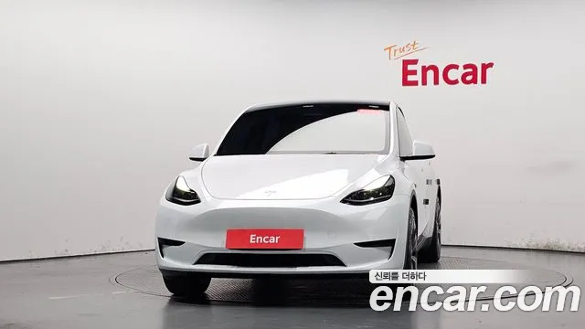 Tesla Model Y — Фото автомобиля 3