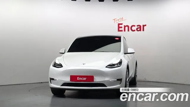 Tesla Model Y — Фото автомобиля 3