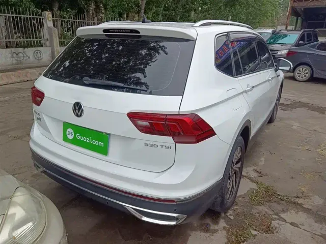 Volkswagen Tiguan L — Фото автомобиля 4