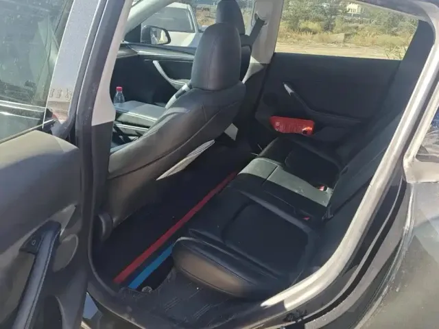 Tesla Model Y — Фото автомобиля 11