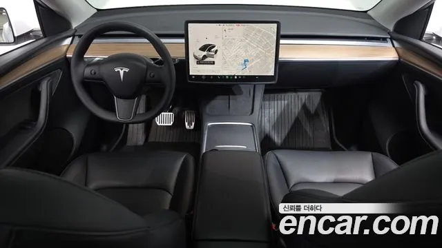 Tesla Model Y — Фото автомобиля 7