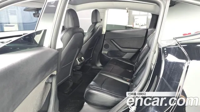 Tesla Model Y — Фото автомобиля 8