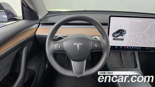 Tesla Model 3 — Фото автомобиля 19