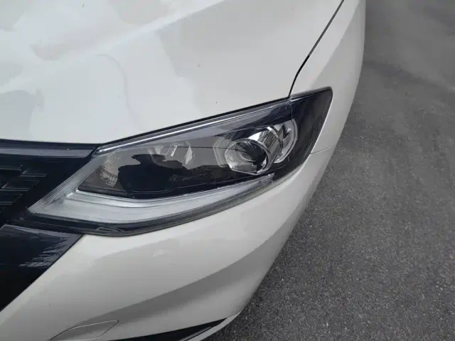 Nissan Tiida — Фото автомобиля 5
