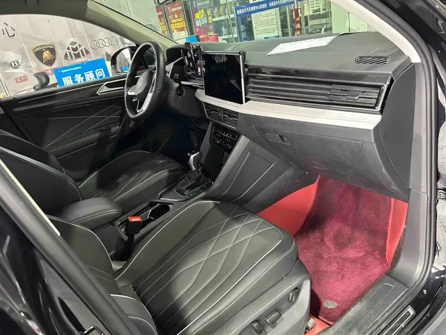 Volkswagen Tiguan L — Фото автомобиля 5