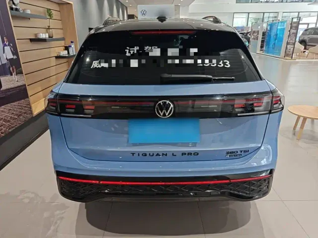 Volkswagen Tiguan L — Фото автомобиля 5