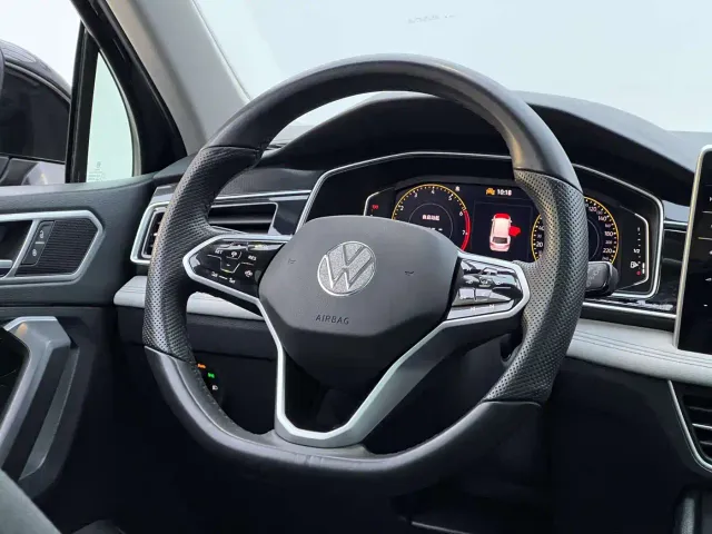 Volkswagen Tiguan L — Фото автомобиля 16