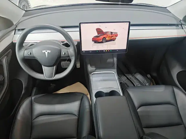 Tesla Model Y — Фото автомобиля 5
