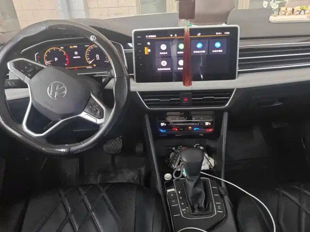 Volkswagen Tiguan L — Фото автомобиля 12