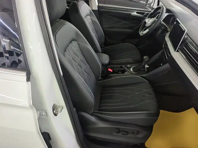 Volkswagen Tiguan L — Фото автомобиля 24