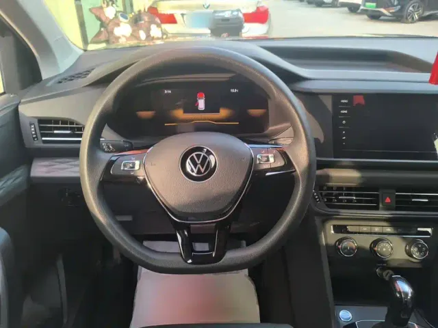 Volkswagen Tharu — Фото автомобиля 11