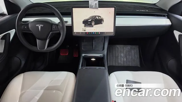 Tesla Model Y — Фото автомобиля 6
